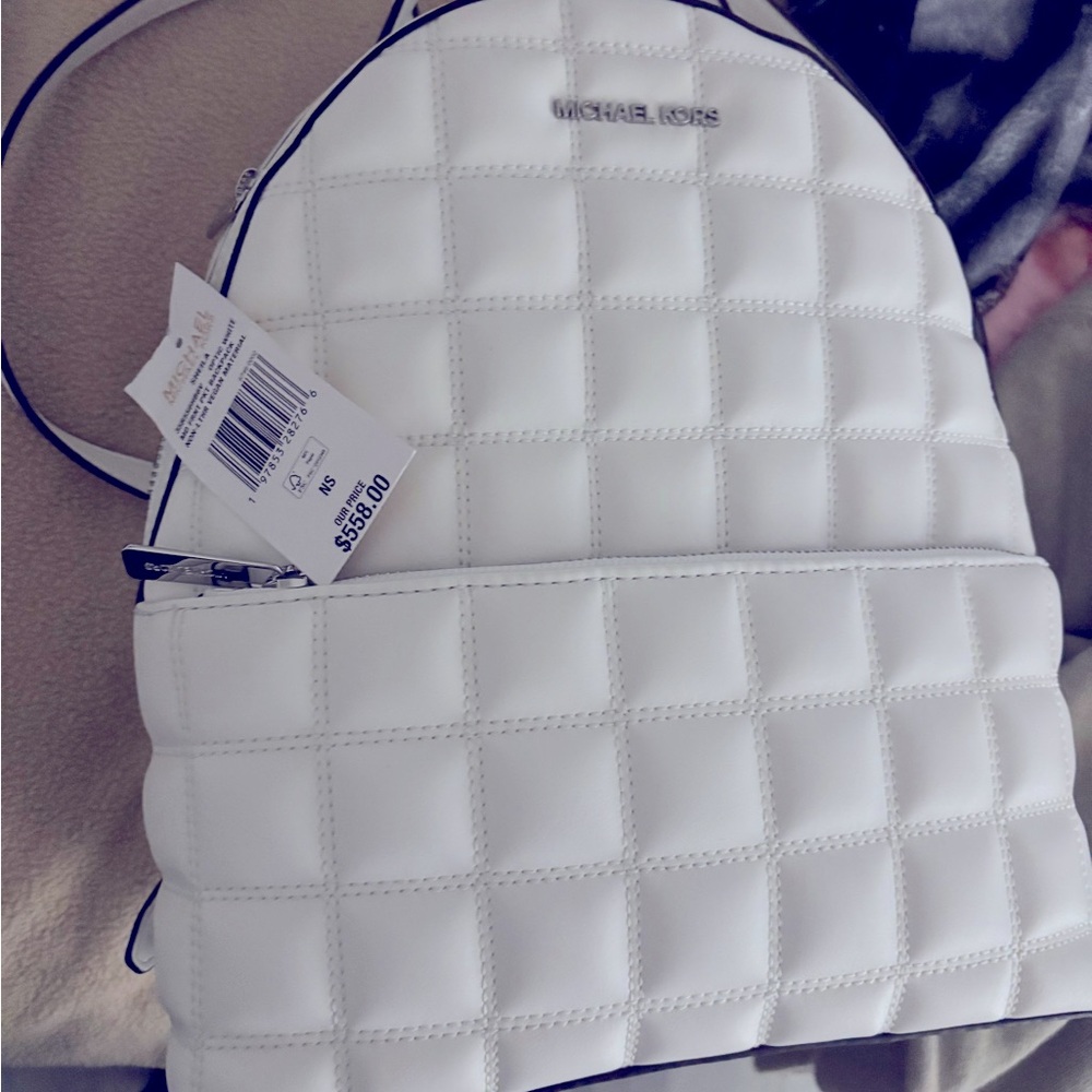 MICHAEL KORS BACKPACKS ONE WHITE ONE PINK